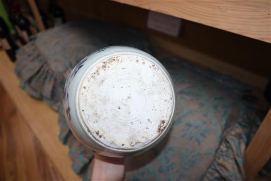 A 17th century Chinese blue and white ovoid jar, unglazed base height 17.5cm, lacking cover